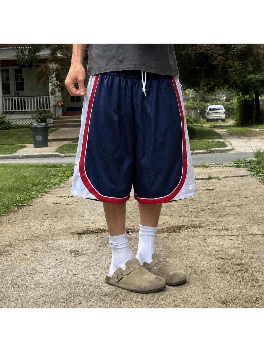 baggy Y2K starter basketball shorts.